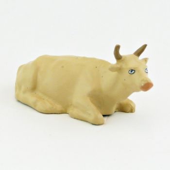 Vache beige couch&eacute;e