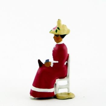 Femme assise en Rose violine cr&egrave;me