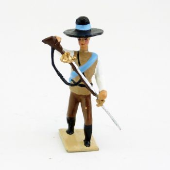 Mexicain pointant son fusil vers le sol