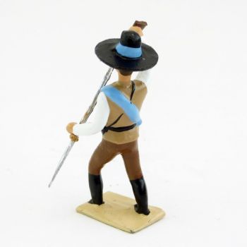 Mexicain pointant son fusil vers le sol