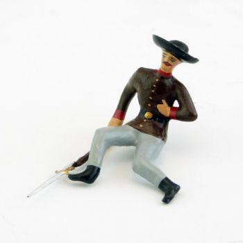 Mexicain blessé au coté, assis avec fusil