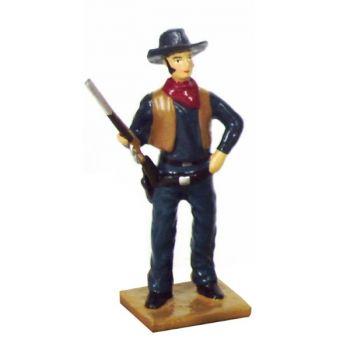 Cow-boy, fusil posé sur la cuisse