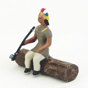 indien assis sur tronc d'arbre avec calumet