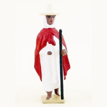 goumier en blanc rouge baton au sol chapeau